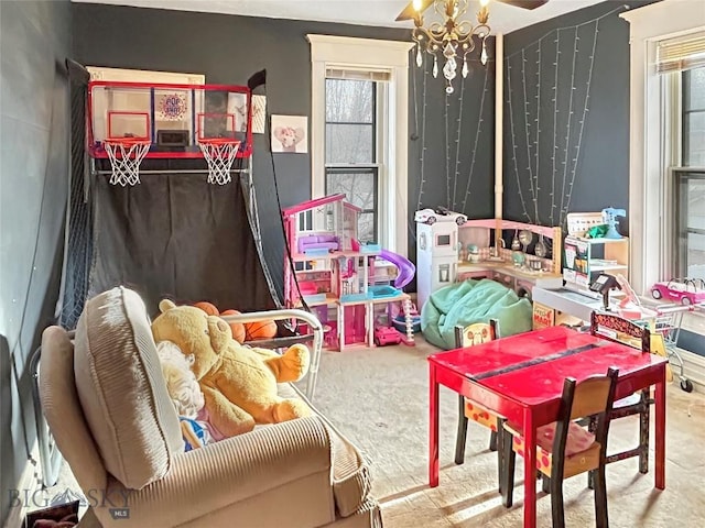 playroom with an inviting chandelier