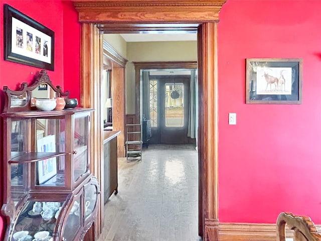 hallway featuring wood-type flooring