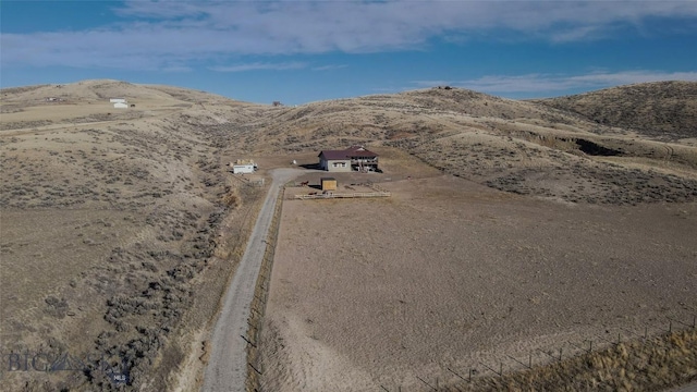 drone / aerial view featuring a mountain view