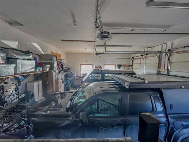 garage featuring a garage door opener