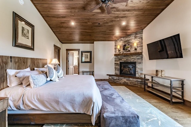 bedroom with ceiling fan, wooden ceiling, vaulted ceiling, and light wood-type flooring