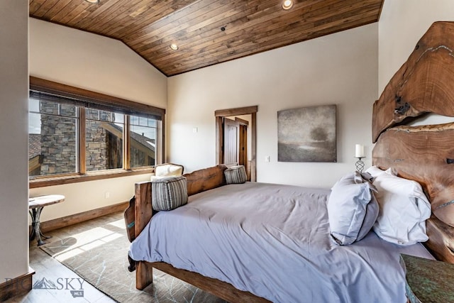 bedroom featuring wood ceiling, lofted ceiling, and light hardwood / wood-style floors