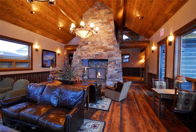 interior space featuring a stone fireplace, dark hardwood / wood-style flooring, high vaulted ceiling, and wooden ceiling