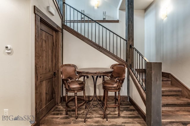 staircase with wood-type flooring