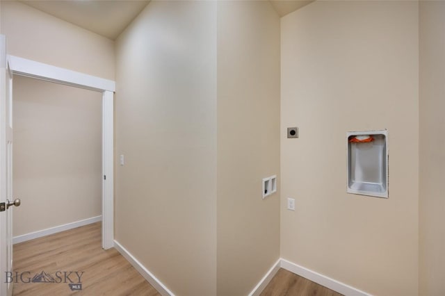 laundry room with washer hookup, light wood-style floors, electric dryer hookup, laundry area, and baseboards