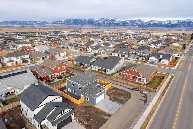 birds eye view of property featuring a mountain view and a residential view