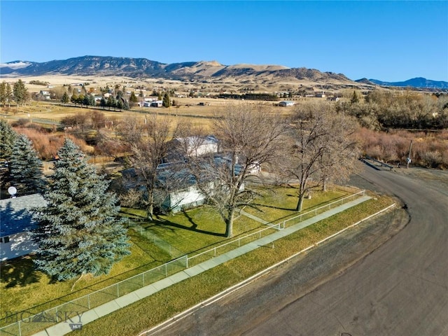 birds eye view of property with a mountain view