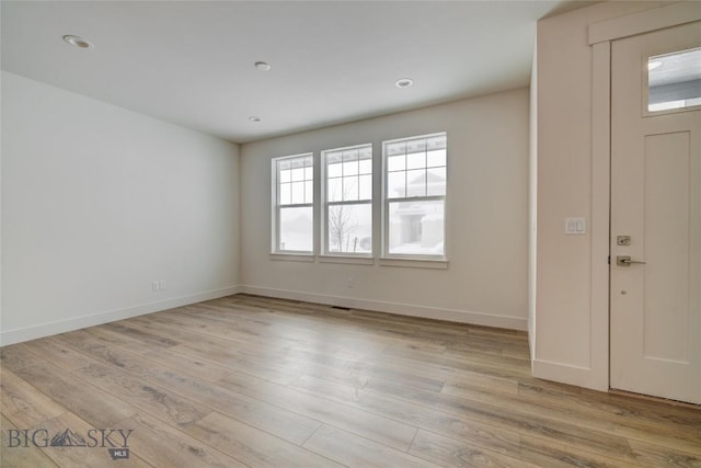 entrance foyer featuring light hardwood / wood-style floors