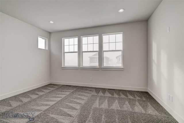 view of carpeted spare room