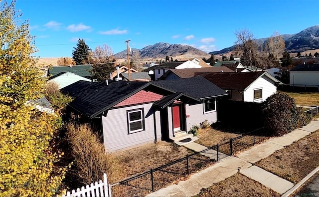 view of front of property with a mountain view