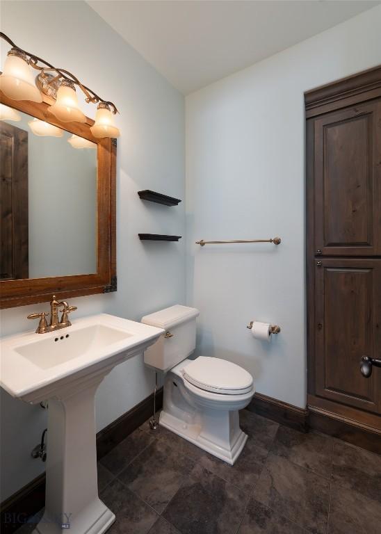 bathroom with toilet and sink