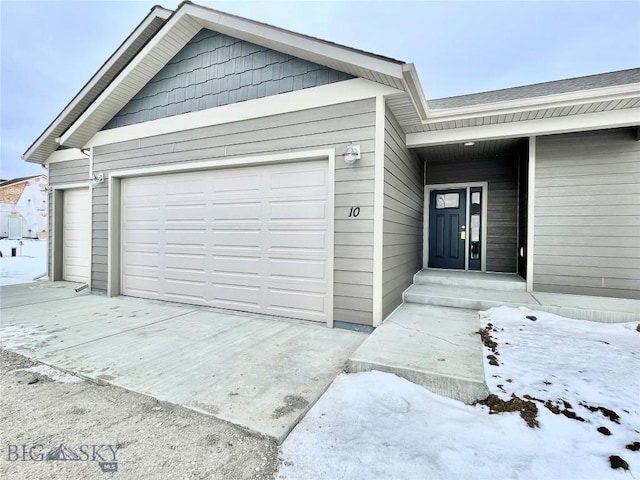 exterior space with a garage