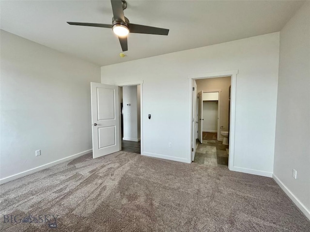 unfurnished bedroom featuring carpet flooring, connected bathroom, and ceiling fan