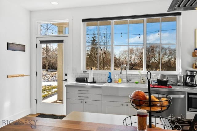 entryway featuring hardwood / wood-style floors and sink