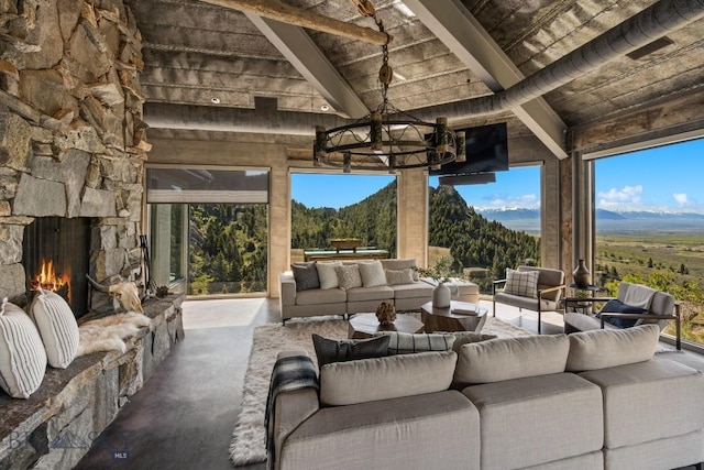 view of patio featuring an outdoor living space with a fireplace