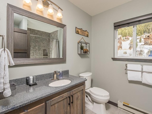 1880 Little Coyote, Big Sky, MT 59716 - full bath with a baseboard heating unit, vanity, toilet, tile patterned flooring, and a tile shower
