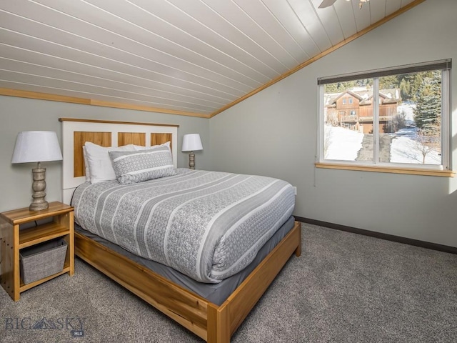 carpeted bedroom featuring lofted ceiling, ornamental molding, and wood ceiling