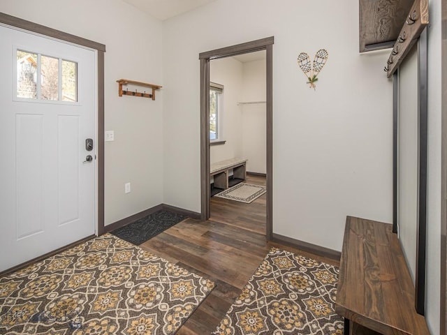 1880 Little Coyote, Big Sky, MT 59716 - entryway with dark wood finished floors and baseboards