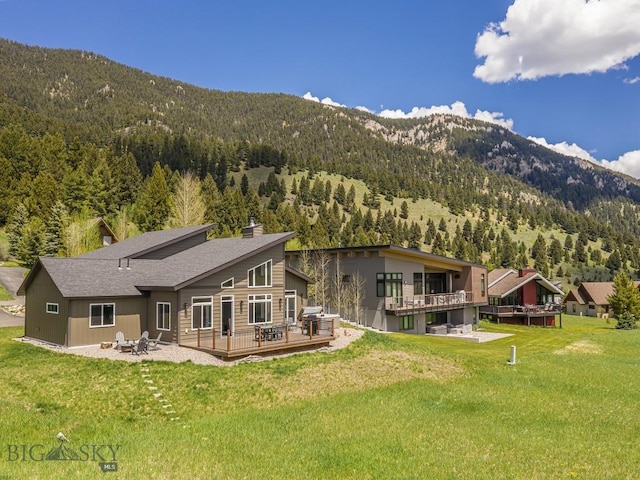 1880 Little Coyote, Big Sky, MT 59716 - view of mountain background with a heavily wooded area