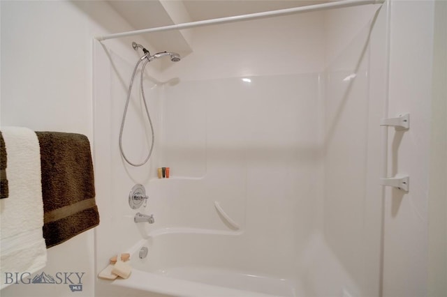 bathroom with shower / bathing tub combination