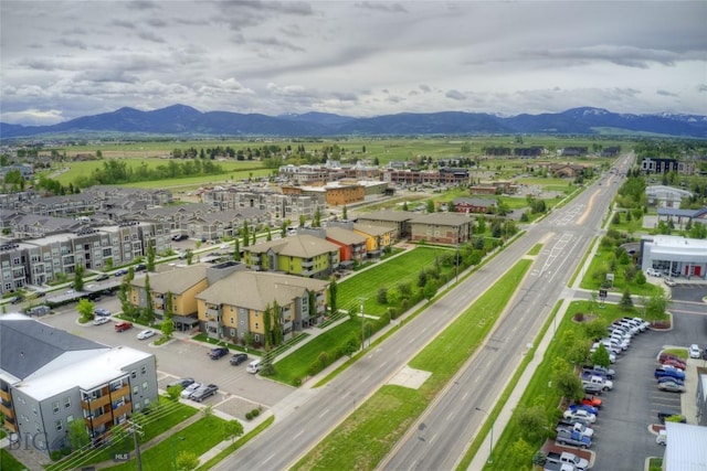 drone / aerial view featuring a mountain view