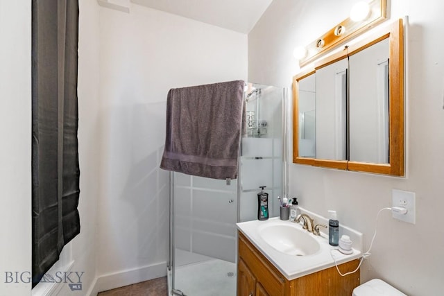 bathroom with vanity and walk in shower