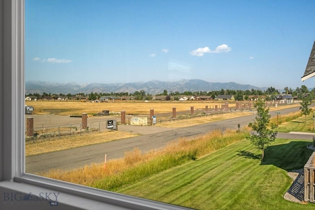 view of mountain feature with a rural view