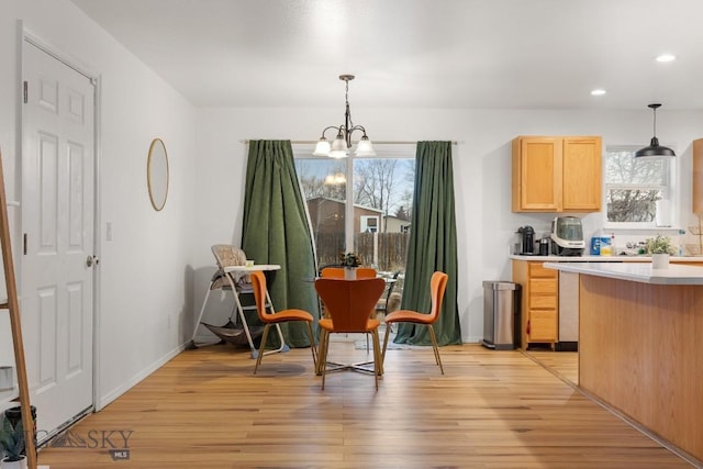 kitchen featuring light brown cabinets, light hardwood / wood-style flooring, and a wealth of natural light