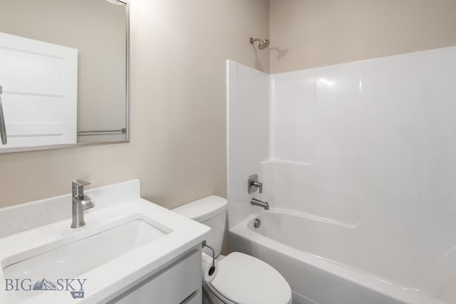 full bathroom with vanity, shower / bath combination, and toilet