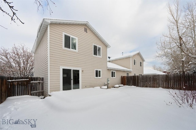 view of snow covered property