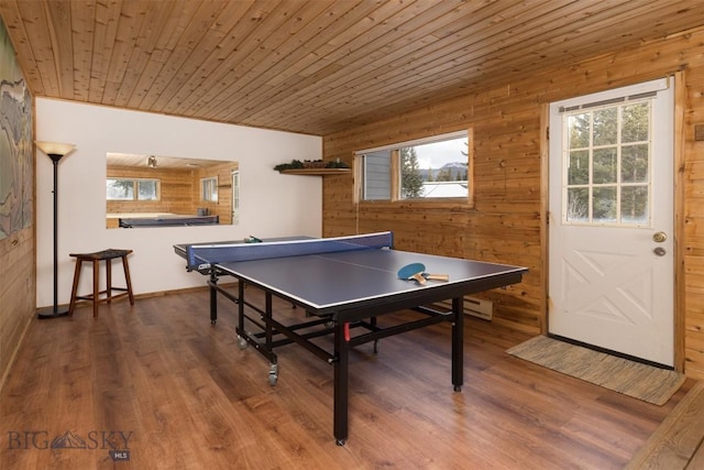 recreation room featuring wood-type flooring, wooden walls, and wooden ceiling