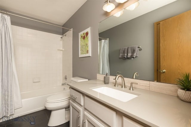 full bathroom with tile patterned flooring, shower / bath combination with curtain, vanity, and toilet