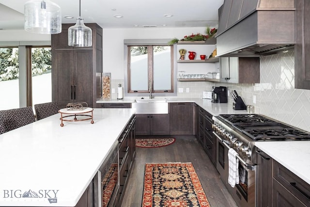 13 Middle Rider, Big Sky, MT 59716 - kitchen with appliances with stainless steel finishes, custom range hood, dark wood-style flooring, plenty of natural light, and recessed lighting