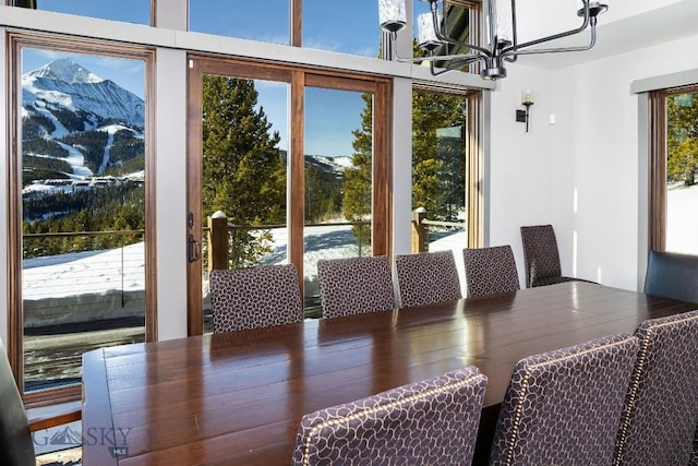 13 Middle Rider, Big Sky, MT 59716 - dining space with a chandelier
