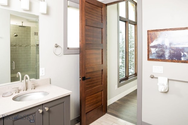 13 Middle Rider, Big Sky, MT 59716 - full bath featuring a stall shower, vanity, and wood finished floors