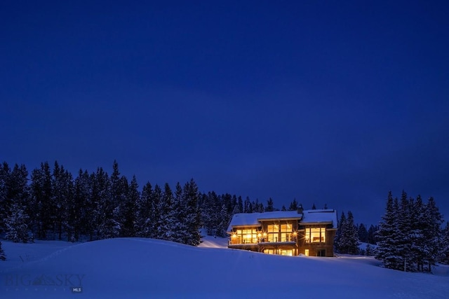 13 Middle Rider, Big Sky, MT 59716 - view of front of house featuring a forest view