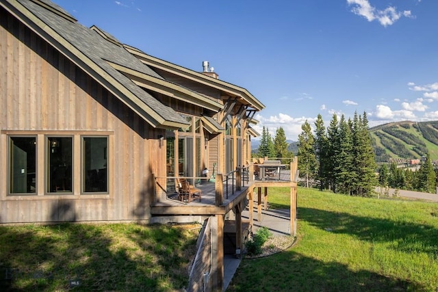 13 Middle Rider, Big Sky, MT 59716 - view of green lawn featuring a deck