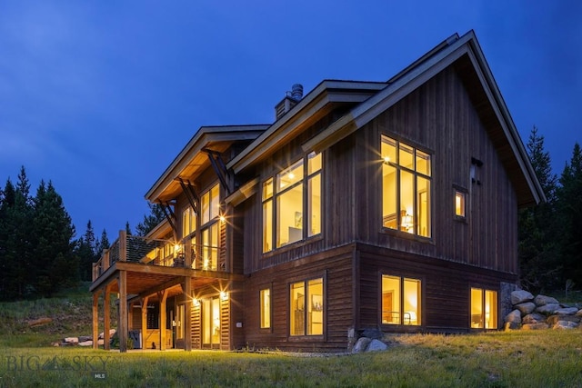 13 Middle Rider, Big Sky, MT 59716 - view of back of house at night