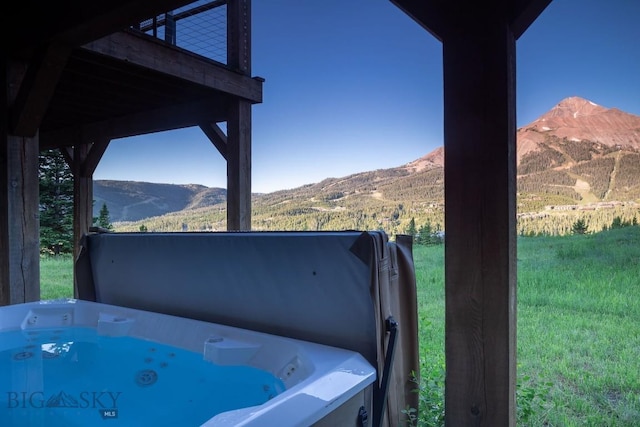 13 Middle Rider, Big Sky, MT 59716 - view of patio with a mountain view