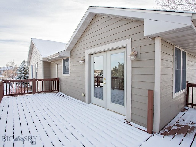 view of snow covered deck