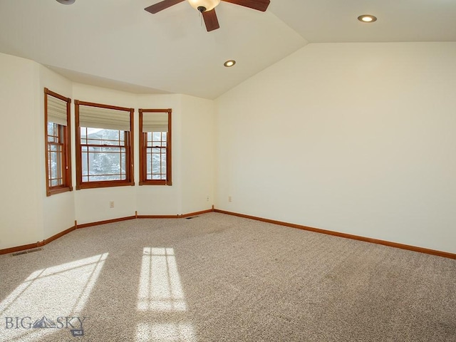 unfurnished room with carpet, ceiling fan, and lofted ceiling