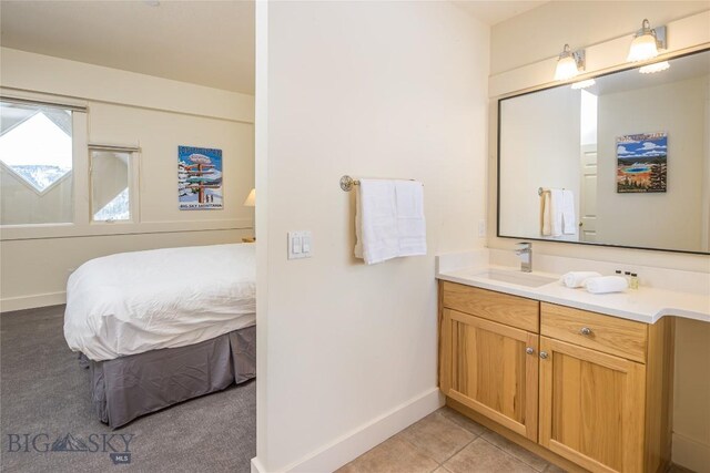 bathroom with vanity and tile patterned floors