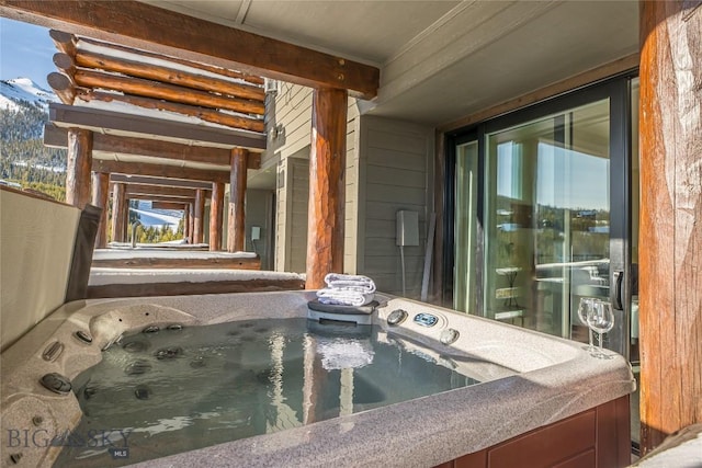 exterior space featuring a hot tub