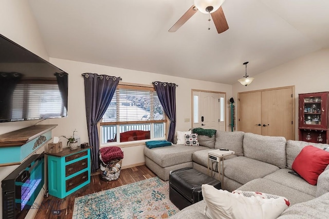 1191 Chipper Ln, Huntley, MT 59037 - living room featuring dark wood-style floors, lofted ceiling, and a ceiling fan