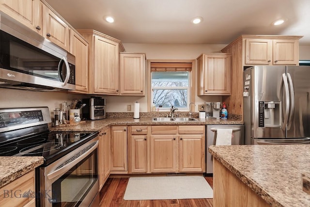 1191 Chipper Ln, Huntley, MT 59037 - kitchen featuring light brown cabinets, stainless steel appliances, a sink, and recessed lighting