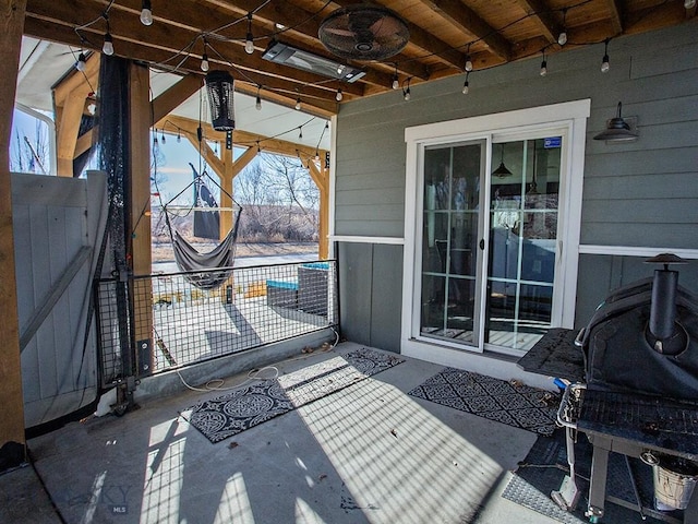 view of patio / terrace featuring ceiling fan