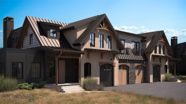 view of front of property with a garage