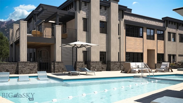 view of pool with a patio area