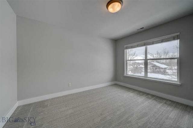 view of carpeted spare room