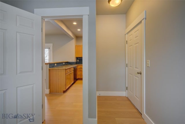 hallway featuring light wood-type flooring